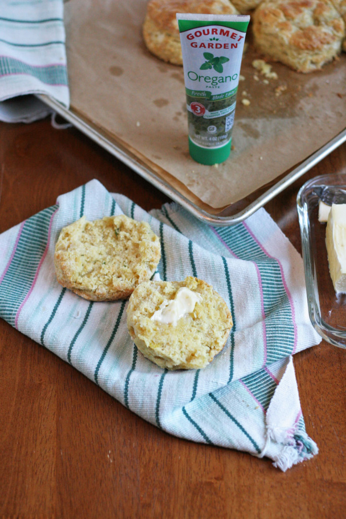 Herb Squash Goat Cheese Biscuits Disclosure: This is a compensated post in collaboration with Gourmet Garden Herbs. As usual all opinions are my own. Thank you Gourmet Garden for making NJB awesomeness possible!  Herb squash biscuits?!!! Yes. Ok, it's just a smidge of squash but it's there, and it is totally necessary. The squash made friends with the Gourmet Garden Oregano that I used in this recipe. They played off one another to give this biscuit a deep savory note that I love. I am a biscuit lover by default. My Mama loves biscuits, so I started playing with them in Culinary School. It's actually a funny story... Remember when I was in Culinary School? That was crazy fun.  We had assignments in each class to complete a list of items, then they would get graded at the end of class. This was breads class, so we had a lull about an hour in after prepping, and proofing our dough. We were an early bird class at seven am, so by nine we were always hungry. I had some extra time, and I tended to play around. I got to making biscuits with an egg on top. I had never made biscuits, and my instructor gave two or three tips and basically said, good luck, it's ok if they don't turn out the first time.     That is a crazy challenge for me, it's on! I made them quickly because you have to work quickly, as to not melt the butter. I pulled them out of the oven, they were perfect. No joke, perfect flaky layers, light, fluffy, and my teacher laughed. Since then, I have worked on a variety of biscuits, and textures. People are very particular when it comes to their biscuit recipes. I like a flaky buttery texture, versus a cake like biscuit, I really don't like those.  Using a product like Gourmet Garden herbs works so well with recipes like this, it's super easy to mix it in with the milk. It doesn't mess with the texture like fresh herbs can. The high quality of these organic, gluten free herbs are so easy to incorporate into your everyday use, and make any dish a bit more special. I used the oregano for a subtle earthy flavor to go with the goat cheese. All of that balances with the super savory notes of the squash, and made a tender, flaky, herby good biscuit.  Herb Squash Goat Cheese Biscuits  Are you a flaky biscuit or cakey biscuit kinda person?  Biscuit making notes:   You can use all purpose flour, or a fine flour. I use a fine flour, not cake flour. Lower protein content of a fine flour creates a lightly texture. Keep everything very cold. The butter cubes, and milk can be kept in the fridge until you're ready to mi it all together. DO NOT OVER MIX. You see how I emphasize this :). It will make a tough dough, which is not good. When using biscuit cutter, do not turn the cutter. Press straight down, and bring straight up. Turning the cutter creates lopsided biscuits. It breaks the flaky layers. Squash: You can use any squash, I used kabocha. You could also use canned pumpkin, sweetpotatoes, yams, russets, or any variety of starch in the squash/potato families. I roasted the squash sliced in 1/2 at 450 degrees for 30 minutes, until tender. I used what I needed for this recipe, and made dinner with the rest of the squash. You could also freeze the leftover squash for later use.  Here are a couple of recipes that would go awesome with these biscuits, and use the rest of the squash or potatoes!  Butternut Squash Pear Soup with Chorizo Brown Rice with Vegetables and Goat Cheese Makes 6 biscuits  Ingredients:  1 1/2 tablespoons Gourmet Garden Oregano  3/4 cup milk  1/4 cup goat cheese  1/4 cup mashed squash, pumpkin, or potato  2 1/2 cups all purpose flour  1 tablespoon baking powder  1 teaspoon baking soda  3/4 teaspoon fine sea salt  10 tablespoons unsalted butter, cubed, keep cold in fridge until use  1 egg with 1 teaspoon water, beaten for brushing tops  3 inch biscuit cutter  Place rack on middle rack, preheat oven to 425 degrees  Method:  1. Add Gourmet Garden Oregano to the milk, whisk together using a fork. Mash the squash and goat cheese together, add to milk, whisk together using fork.  2. In a large bowl, whisk together flour, baking powder, baking soda, and salt. Add the cold butter cubes to the flour. Toss into flour, then rub butter into flour using your fingers, creating small pea sized chunks. Work quickly but gently. Add the milk/herb mixture to flour, using a spatula, mix gently until just combined. Do not over mix here.  3. Turn dough out onto a lightly floured counter. Bring dough together using your hands, forming a circle about 1 1/2 inches thick. Using the biscuit cutter, press straight down, do not turn. Bring together after each cut, gently and press dough together. Place on parchment lined baking sheet. If you have time and space, place in the freezer for 10 minutes. Brush tops with egg wash, place in oven and bake for 18-20 minutes.  Remove and cool for a few minutes before serving. Serve warm with a variety of dishes like breakfast, ratatouille, or tasty soup!  Herb Squash Goat Cheese Biscuits